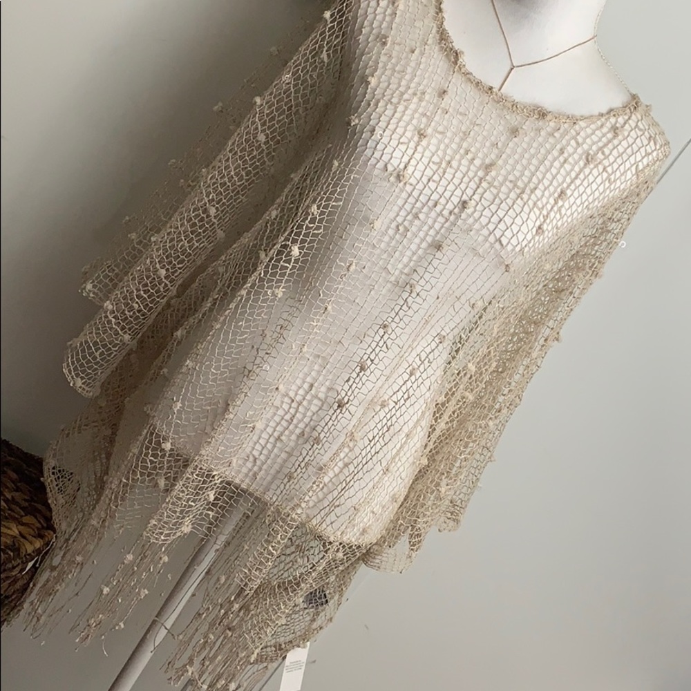 Popcorn stitch poncho